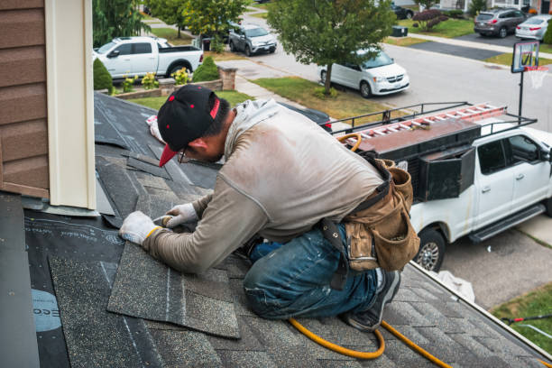 Professional Flat Roof Repair technician working in Orient, WA